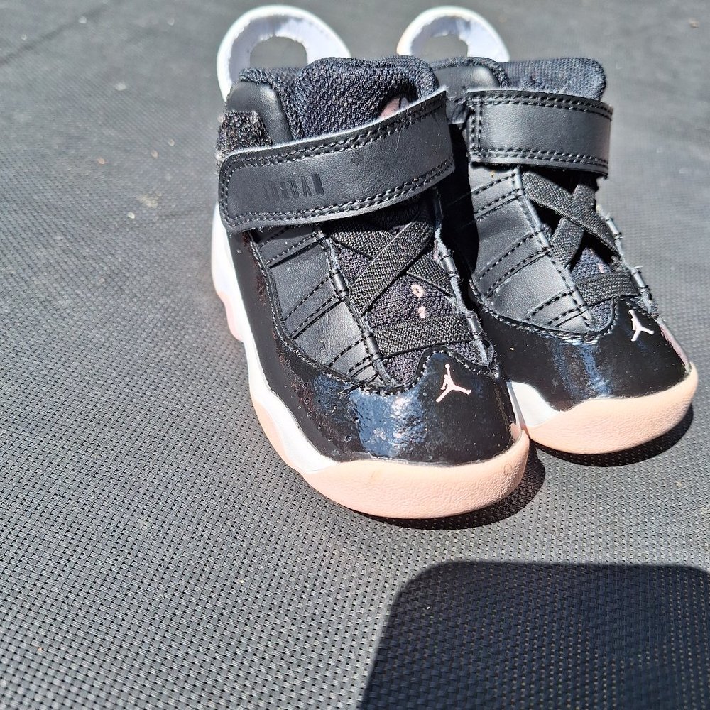 Pink and black jordan toddler sneakers